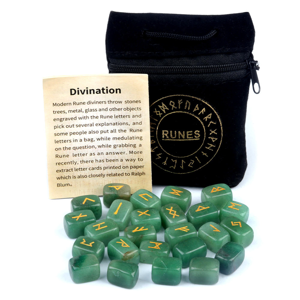 A pile of green aventurine tumbled stones engraved with gold Elder Futhark rune symbols.