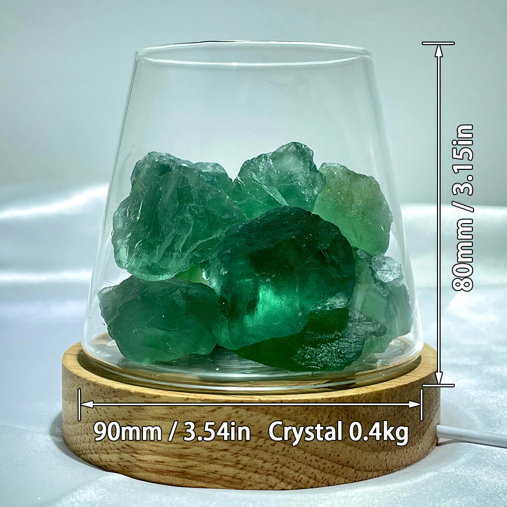 A glass and wood lamp filled with raw green fluorite, showing dimensions of 80mm by 90mm