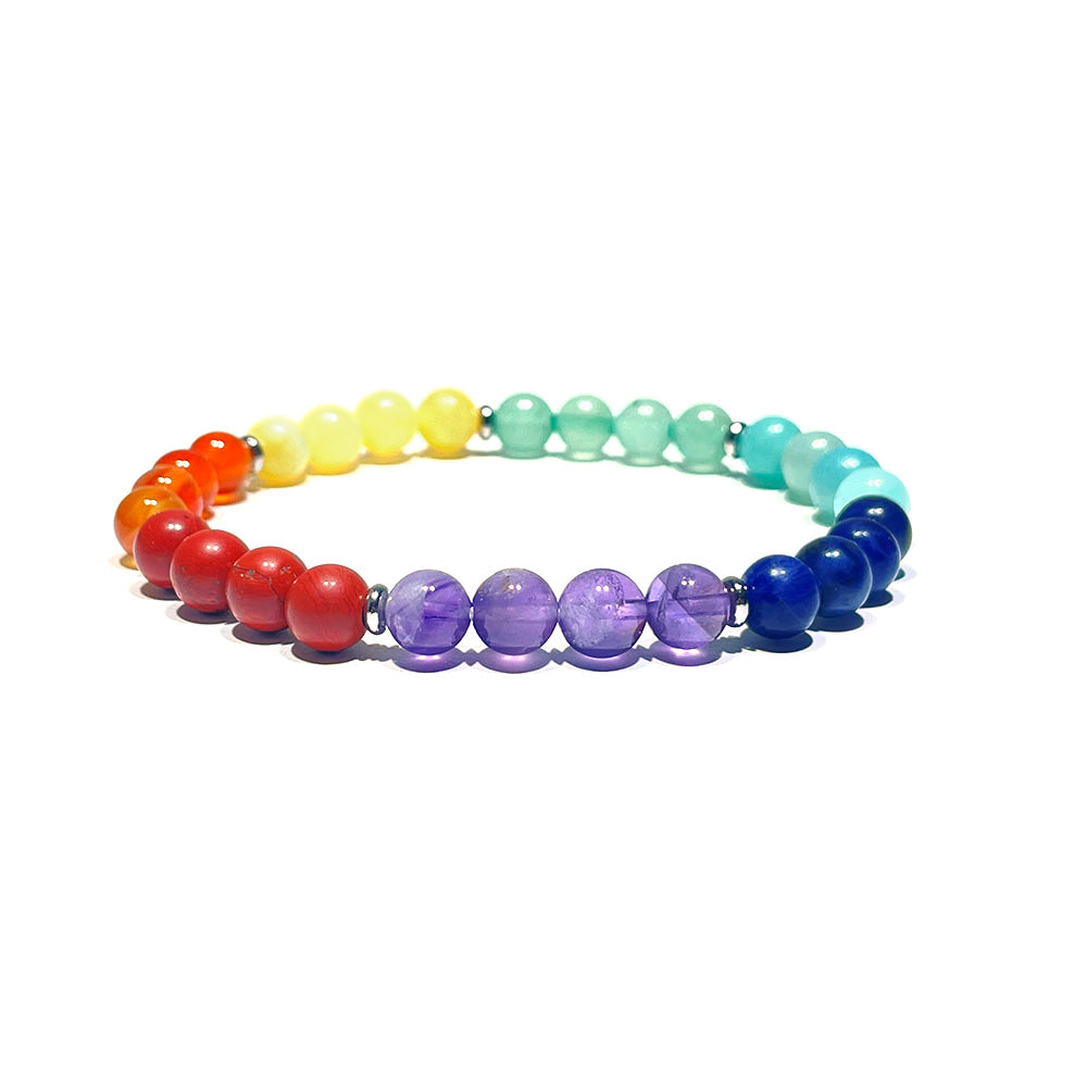 A 7 chakra gemstone stretch bracelet with a vibrant rainbow of 6mm beads.