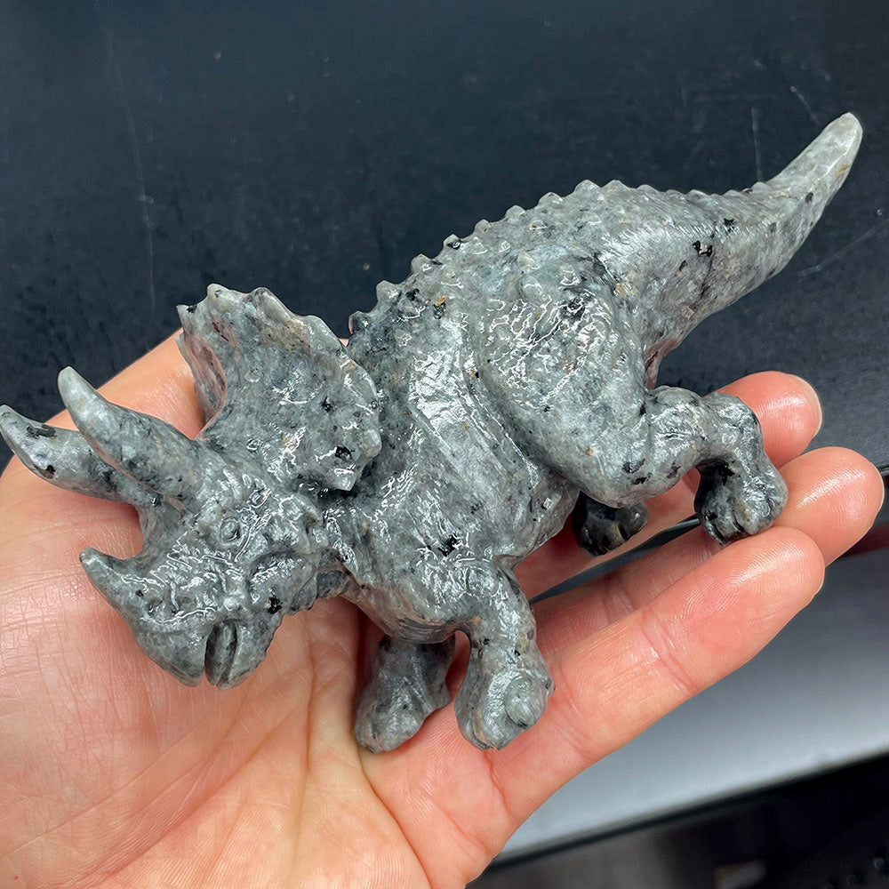 Top view of a grey Yooperlite stone triceratops statue showing the texture of the frill and horns