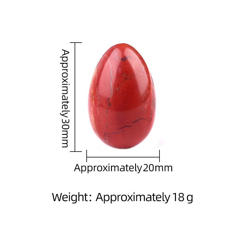 A red jasper crystal egg showing dimensions of 30mm tall and 20mm wide