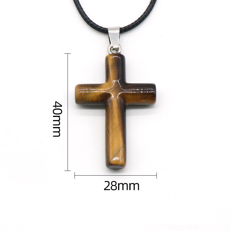 A tiger's eye cross pendant with dimensions shown in millimeters in Chinese characters