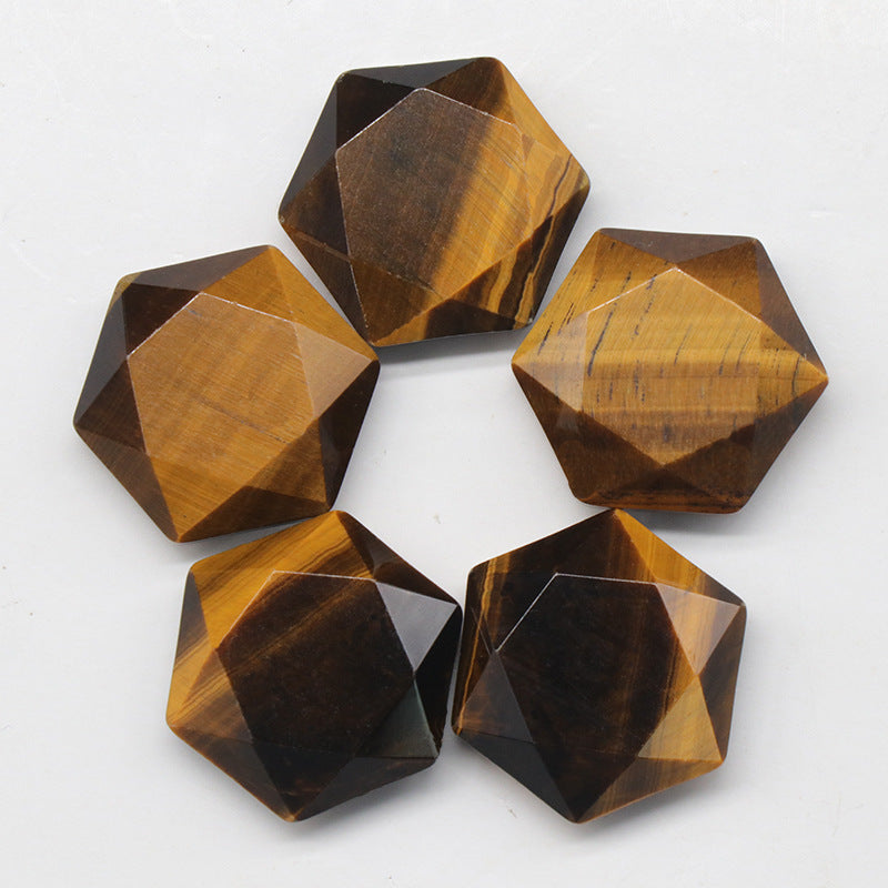 Five polished tiger's eye faceted hexagons arranged in a circle.